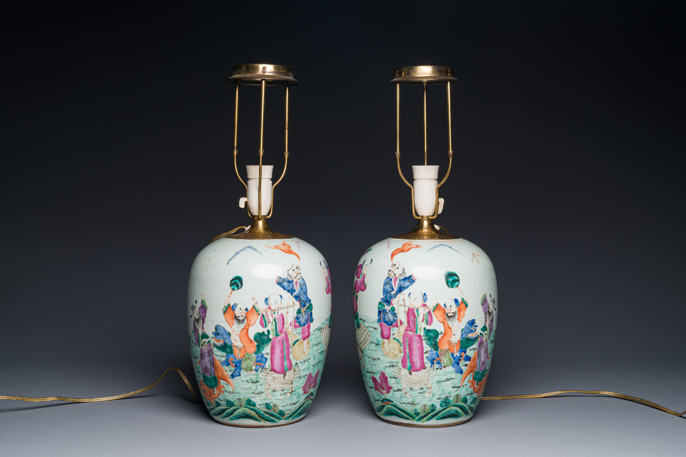 A pair of Chinese famille rose 'Eight Immortals' jars mounted as lamps, 19th C.