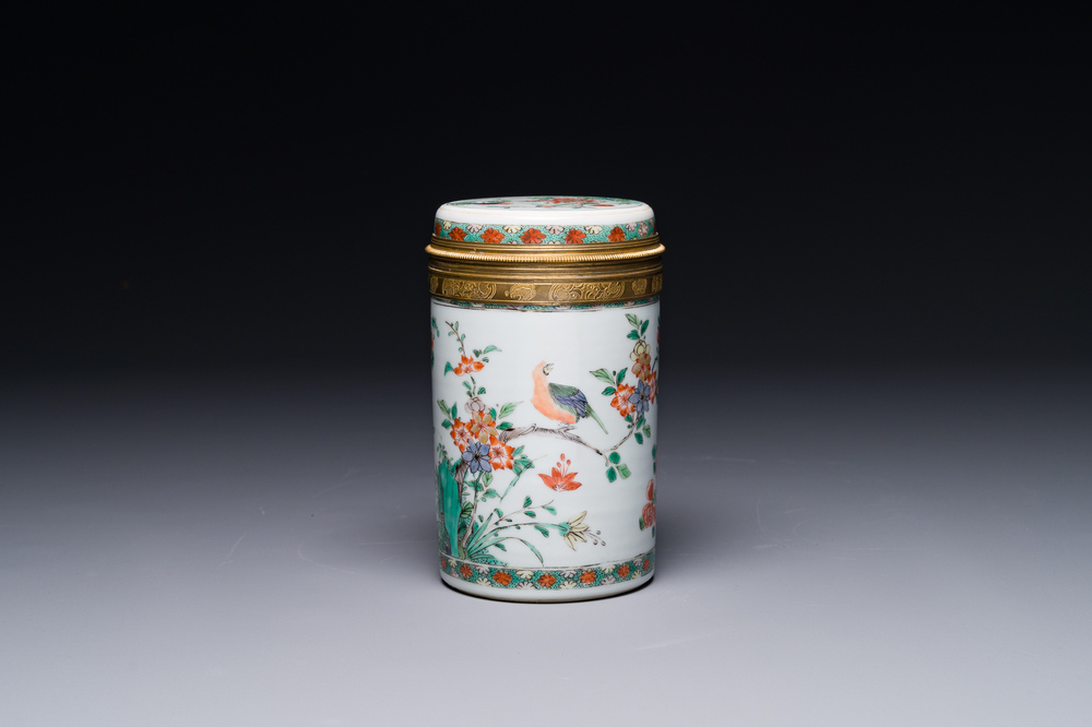 A Chinese famille verte cylindrical box and cover with gilt bronze mount, Kangxi