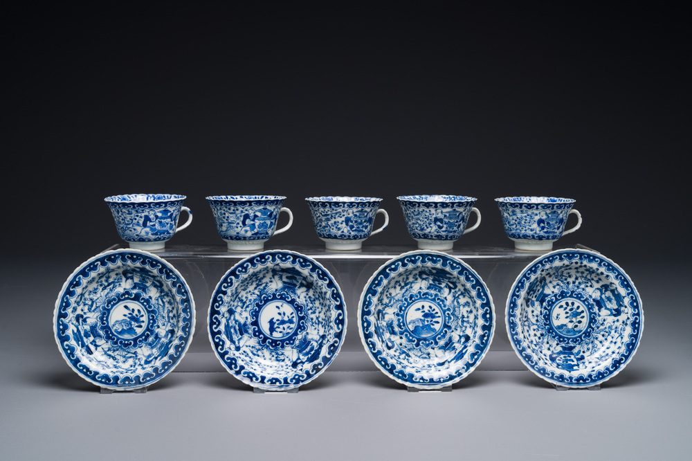 Five Chinese blue and white cups and four saucers with boys carrying a vase, Kangxi mark, Guangxu