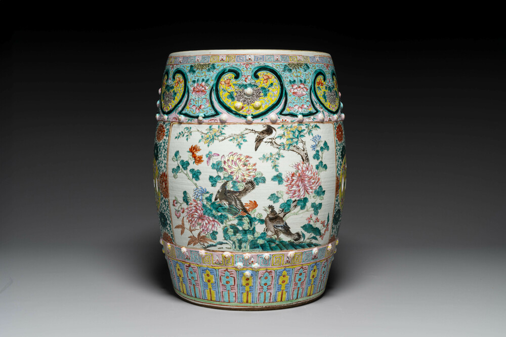A Chinese famille rose garden seat with birds among blossoming branches, 19th C.