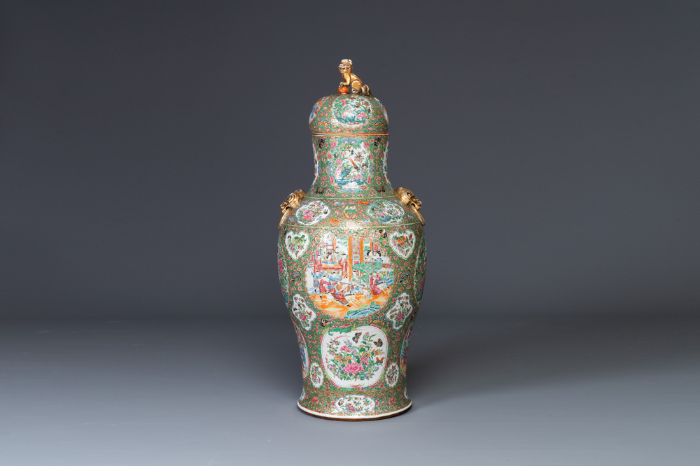 A large Chinese Canton famille rose vase and cover with narrative design, 19th C.