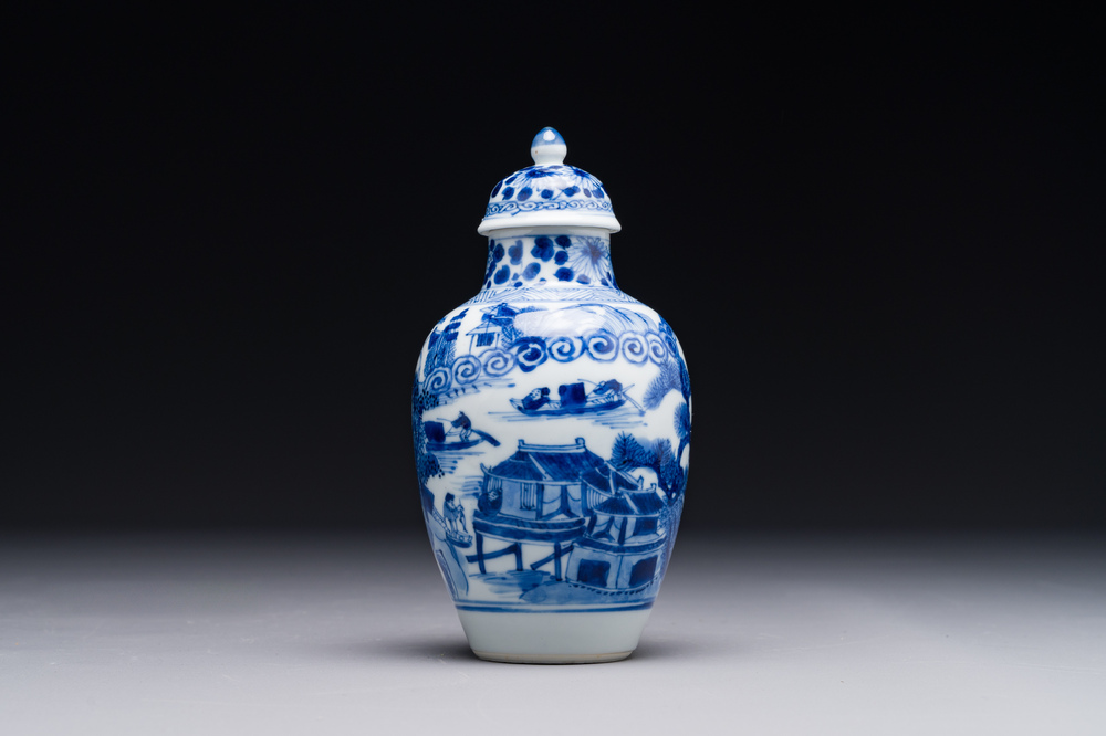 A Chinese blue and white covered vase with fishermen in a river landscape, jade mark, Kangxi