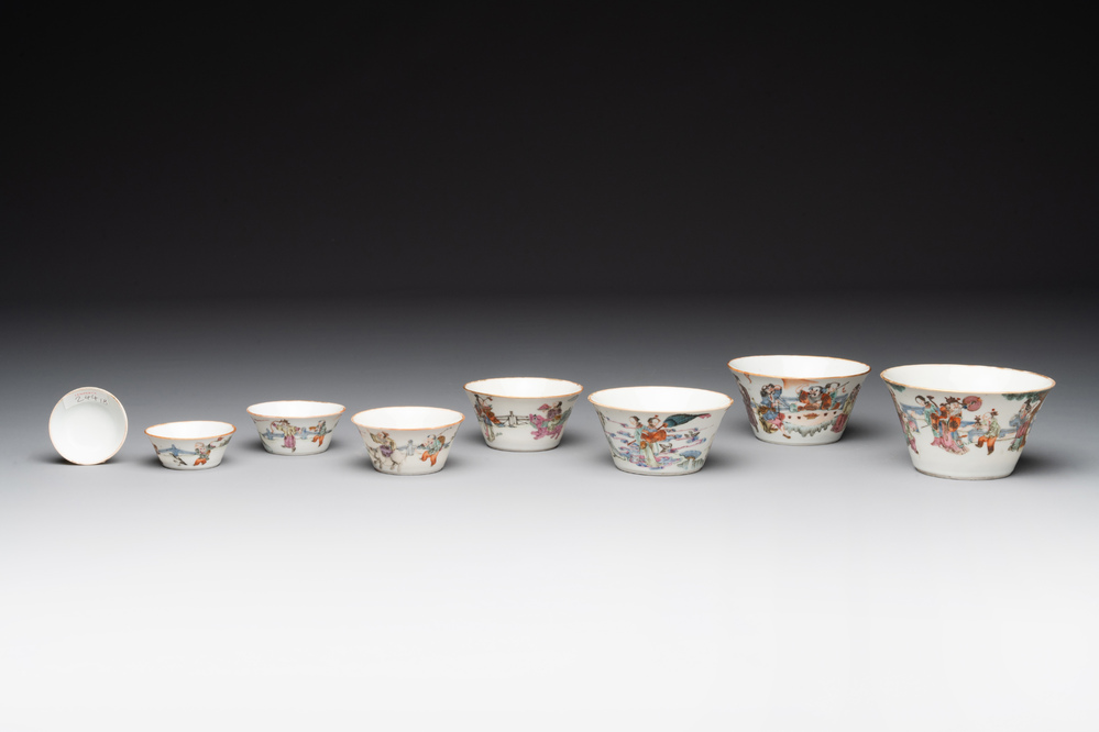 A rare set of eight Chinese famille rose 'Sanxing' nesting bowls, Tongzhi mark and of the period