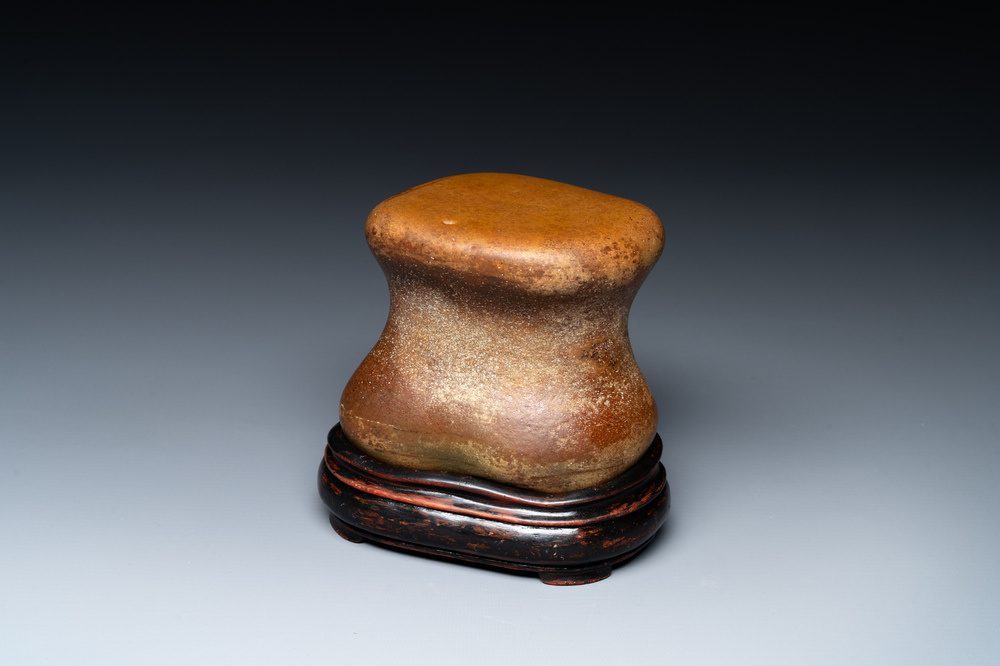 A Chinese scholar's rock on wooden stand, Ming or later