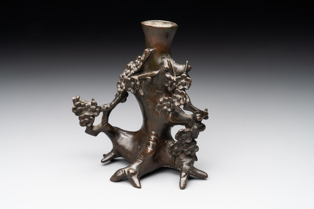 A Chinese bronze vase in the shape of a prunus, Ming