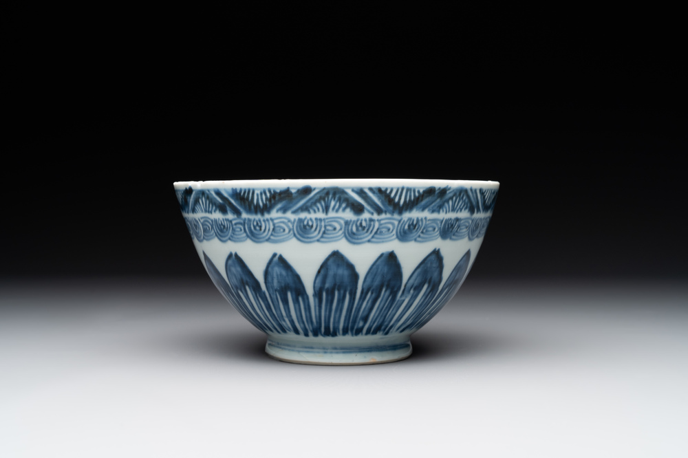 A rare Chinese blue and white 'lotus' bowl, Transitional period