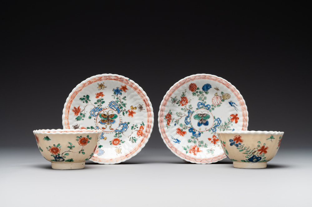 A pair of Chinese famille verte cafe-au-lait-ground cups and saucers, Kangxi