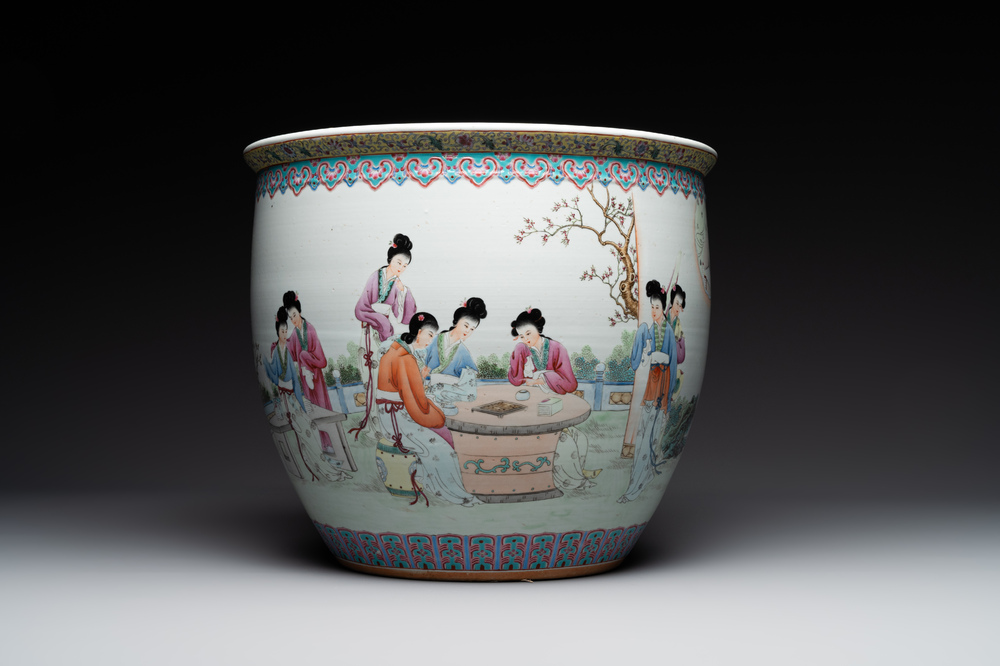 A Chinese famille rose jardiniere with ladies in a garden, 20th C.