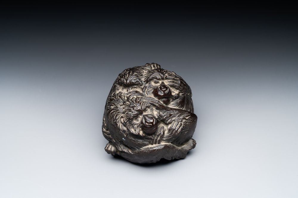 A Japanese bronze okimono with three monkeys, Yoshinobu seal mark, Meiji period