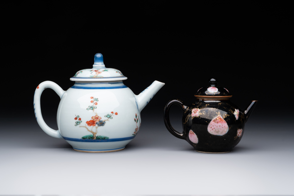 A Chinese famille verte teapot and a famille rose black-ground teapot, Kangxi/Yongzheng