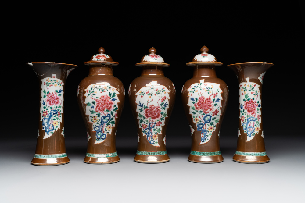A Chinese capucin-brown-ground famille rose garniture of five vases with floral design, Qianlong