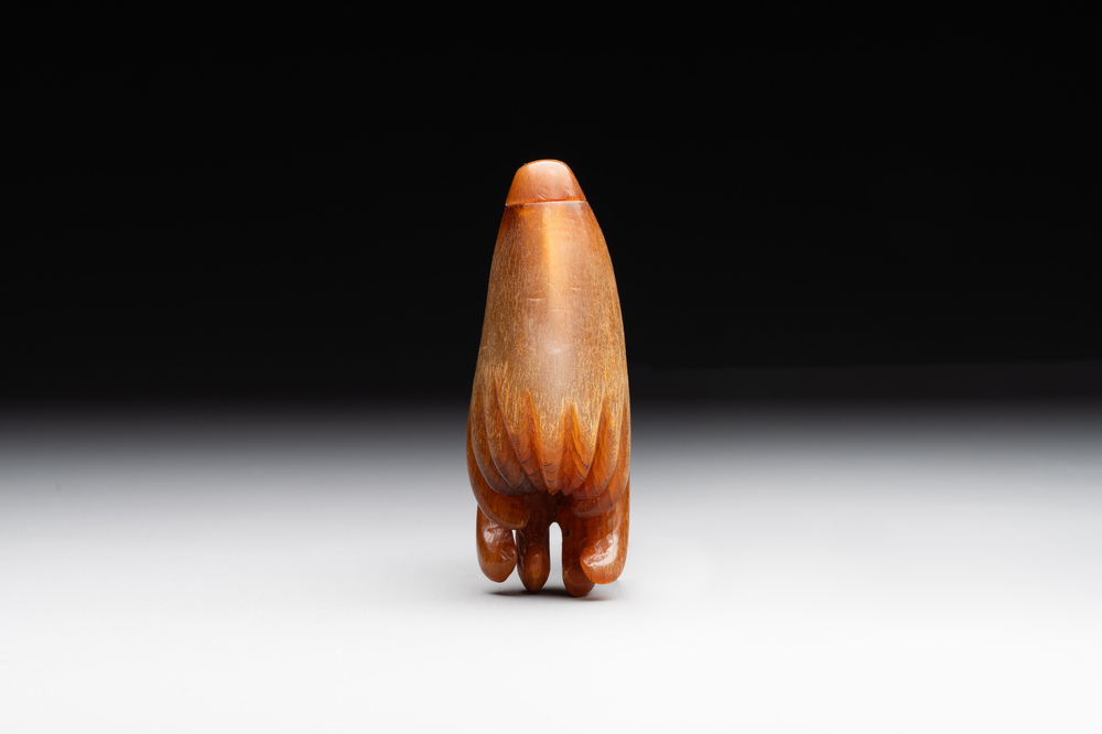 A rare Chinese rhinoceros horn snuff bottle in the shape of a Buddha hand, 19th C.
