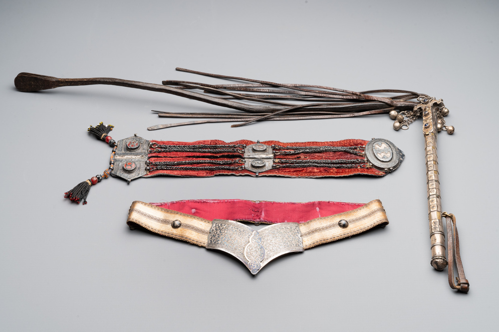 A gold lame woman's belt, a breast ornament and a silver karwat, Caucasus and Afghanistan, 19th C.