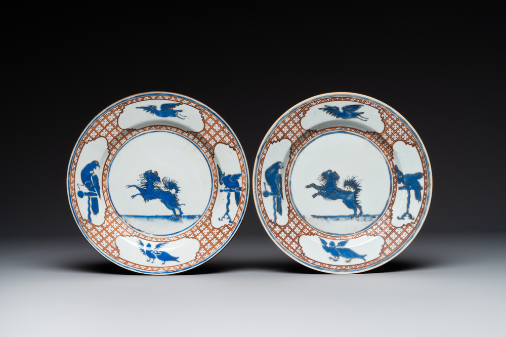 A pair of Chinese 'leaping pekinese' plates, possibly after a design by Cornelis Pronk, Qianlong, ca. 1740