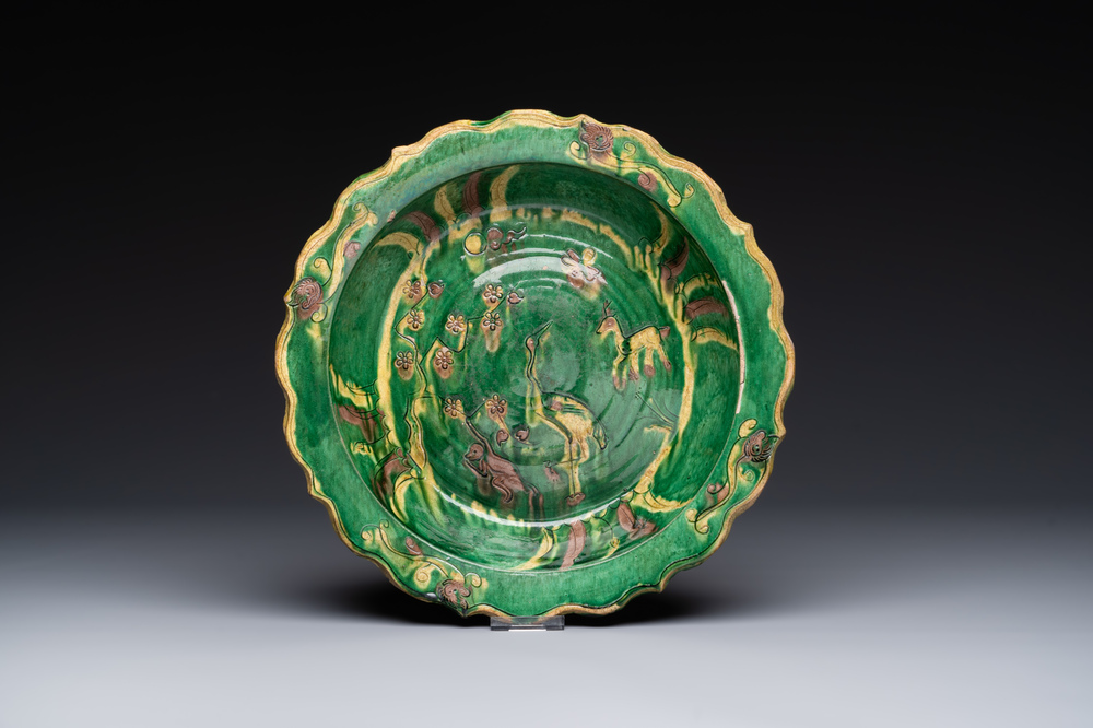 A Chinese sancai-glazed flower-shaped 'crane' plate, Ming
