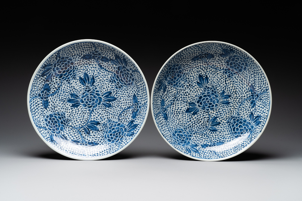 A pair of Chinese blue and white 'peony' dishes, Chenghua mark, 19th C.