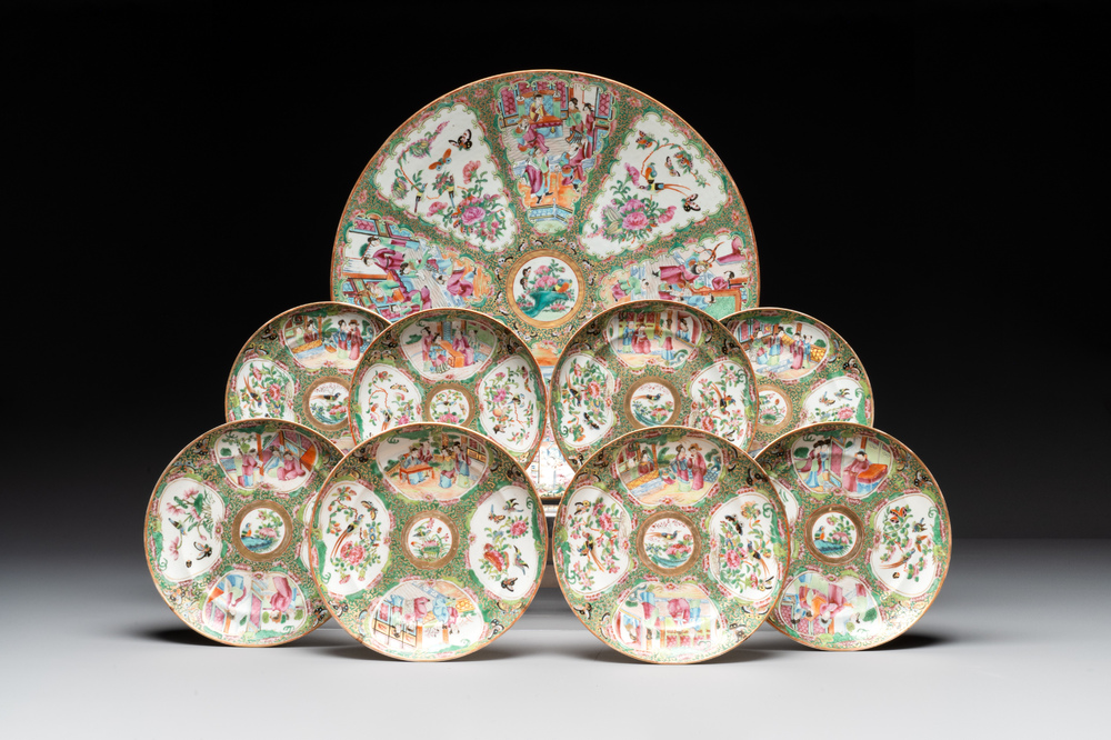 A large Chinese Canton famille rose dish and eight plates, 19th C.