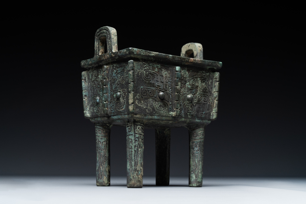 A Chinese rectangular bronze food vessel, 'fang ding 方鼎', Western Zhou