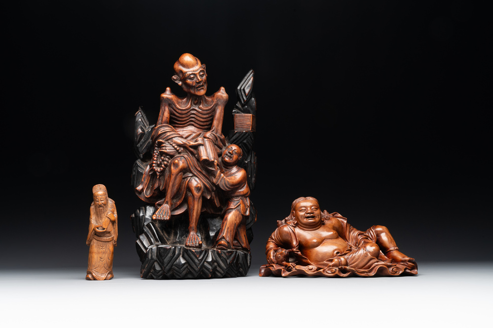 Two Chinese boxwood sculptures of Luohan and Liuhai and a bamboo sculpture of a sage, 17/19th C.