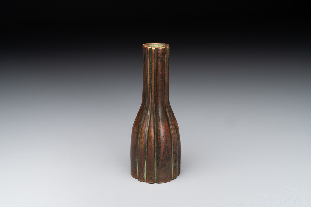 A rare Chinese ribbed bronze flower arranging vase, Ming