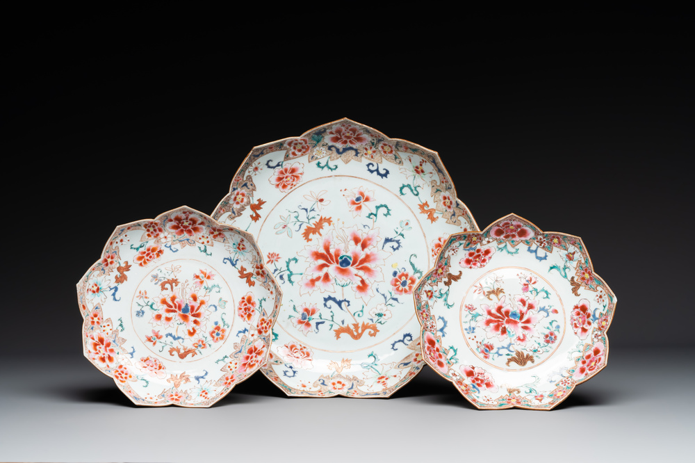 A Chinese famille rose lotus-shaped dish and two plates, Qianlong