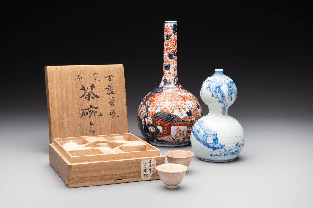 A Japanese blue and white gourd vase, an Imari bottle vase and a set of five Satsuma cups, 19th C.