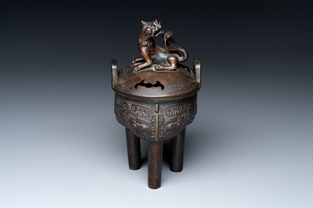 A fine Chinese bronze censer and cover with a Buddhist lion, 'ding 鼎', Xuande Mark, Ming