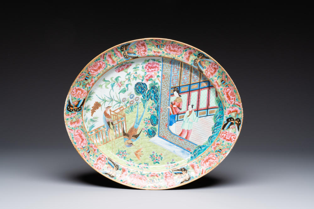 A Chinese Canton famille rose dish with a lady, servant and pheasants, 19th C.