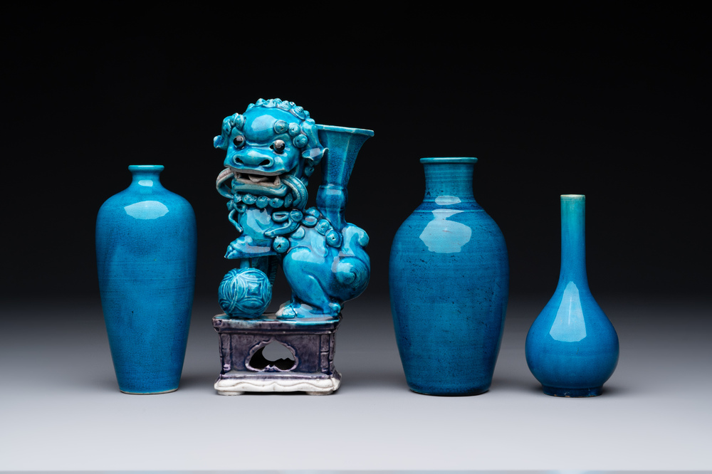 Three Chinese turquoise-glazed vases and a turquoise and aubergine-glazed Buddhist lion, Kangxi