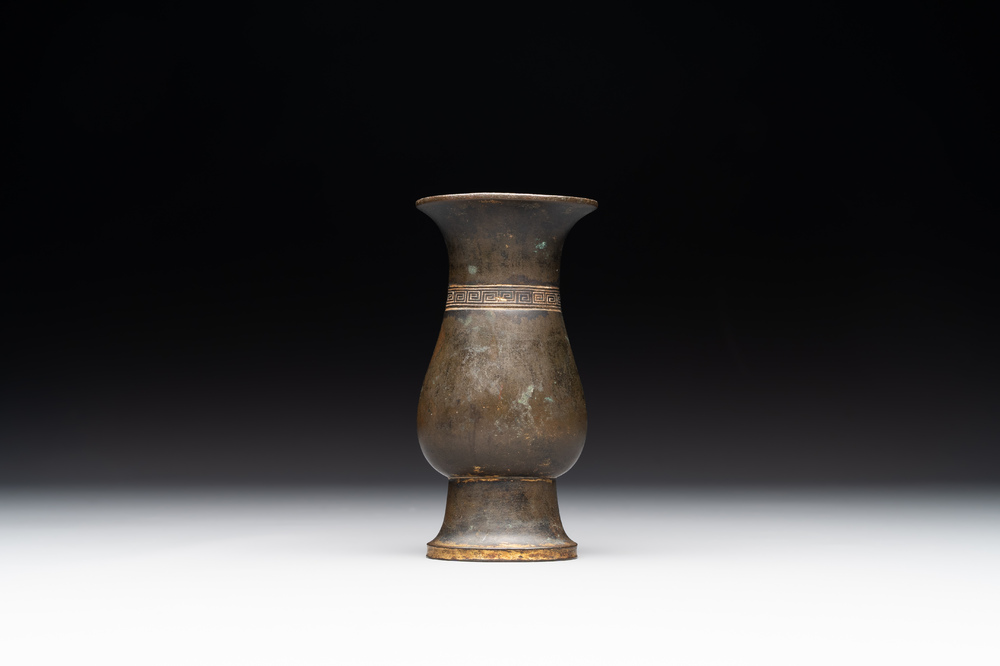 A rare Chinese parcel-gilt bronze ritual wine vessel, 'zhi 觯', Ming