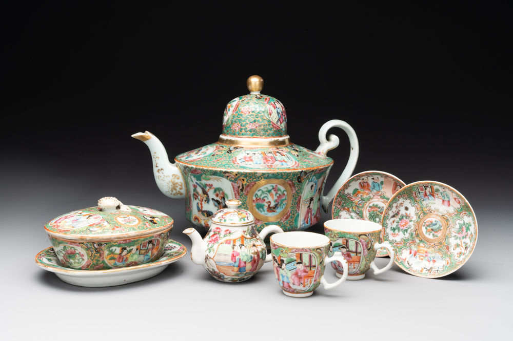 Two Chinese Canton famille rose teapots, a small covered tureen with stand, two cups and two saucers, 19th C.