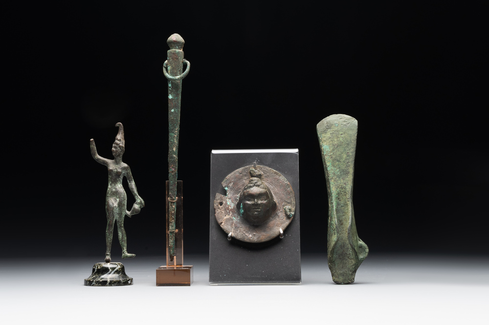 A varied collection of four bronze objects and figures, Roman Empire, 8th C. B.C./3rd C.