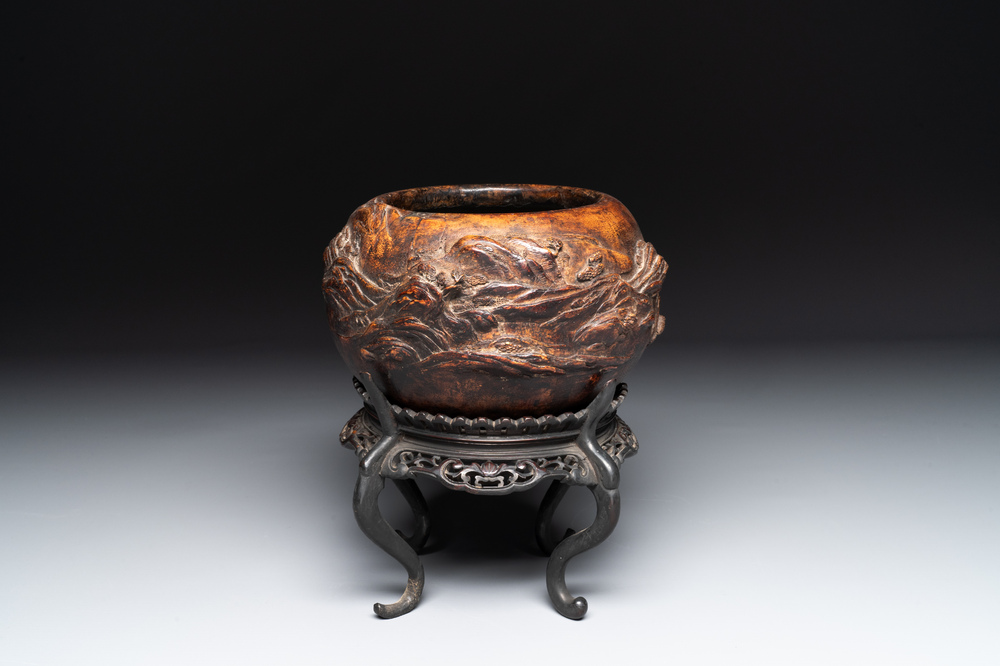 A Chinese agarwood brush washer with landscape relief design on wooden stand, 17/18th C.