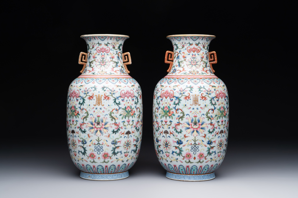 A pair of Chinese famille rose vases with floral design, Jiaqing mark, 19/20th C.