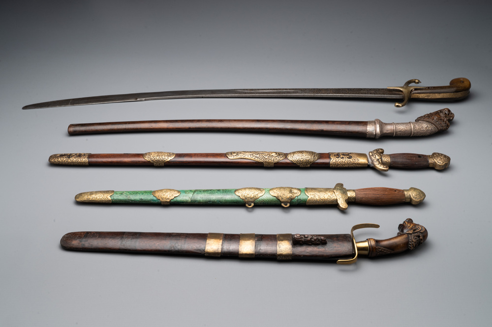 A silver plated dagger and four swords, China, Burma and Indonesia, 18/19th C.