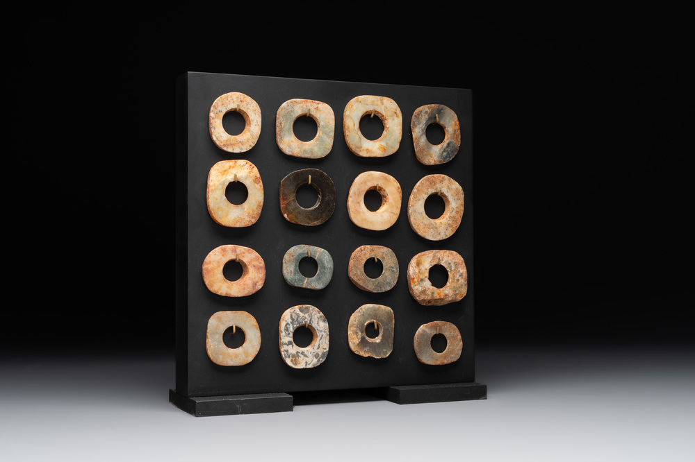 A collection of 16 Chinese neolithic jade 'bi' discs, probably Shang