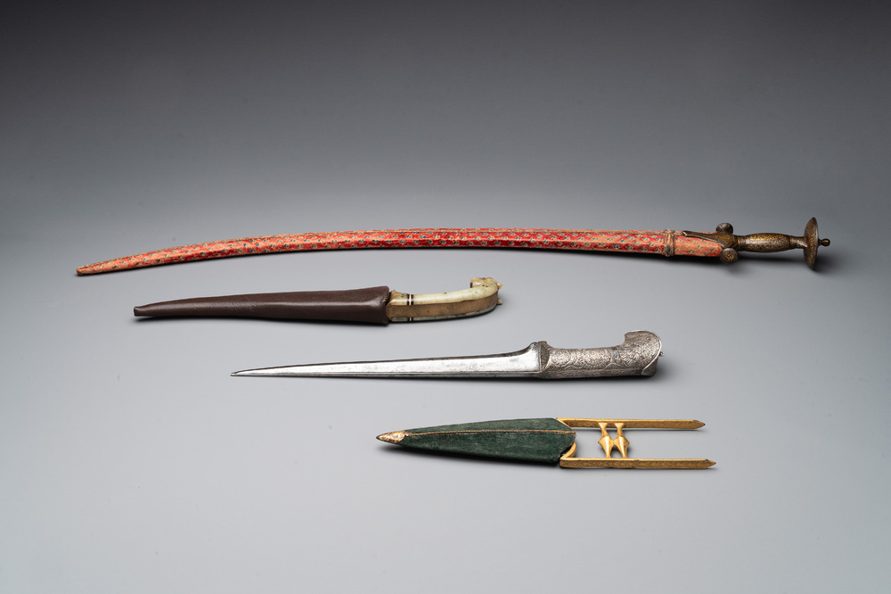 A collection of three daggers decorated with jade, silver and gold and an Indian mogul sword, India, 17/19th C.