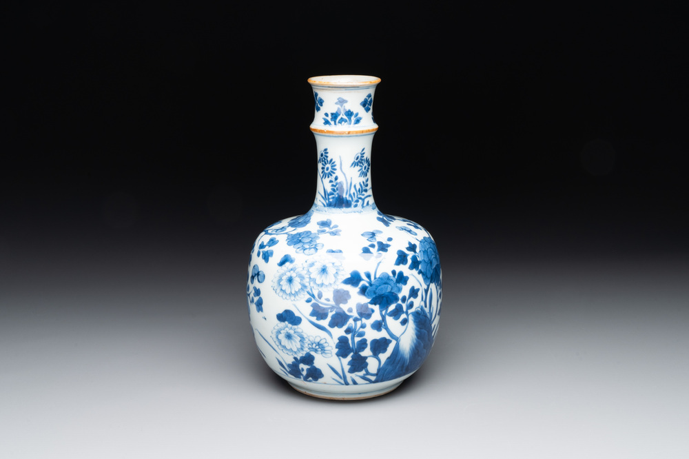 A Chinese blue and white bottle-shaped huqqa base with floral design for the Islamic market, Kangxi
