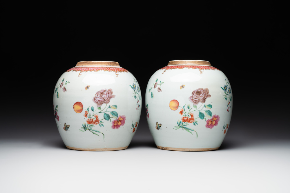 A pair of fine Chinese famille rose 'botanical Merian-style' jars with wooden covers, Qianlong