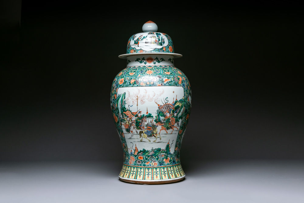 A large Chinese famille verte 'warriors on horseback' vase and cover, 19th C.