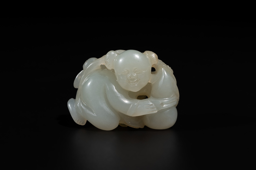 A Chinese white jade sculpture of a boy and a double gourd, Qing