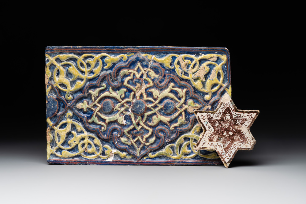 An Kashan lustre-glazed star tile and a rectangular moulded ornamental tile, Persia, 13/14th C.