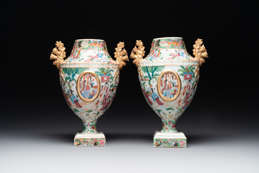 A rare pair of Chinese Canton famille rose export urns, 19th C.