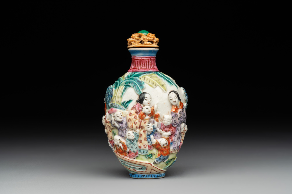 A Chinese famille rose moulded snuff bottle, Qianlong mark, late 18th/early 19th C.