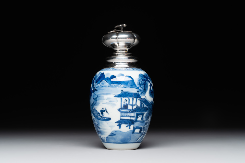 A Chinese blue and white silver mounted tea caddy with a river landscape, Kangxi