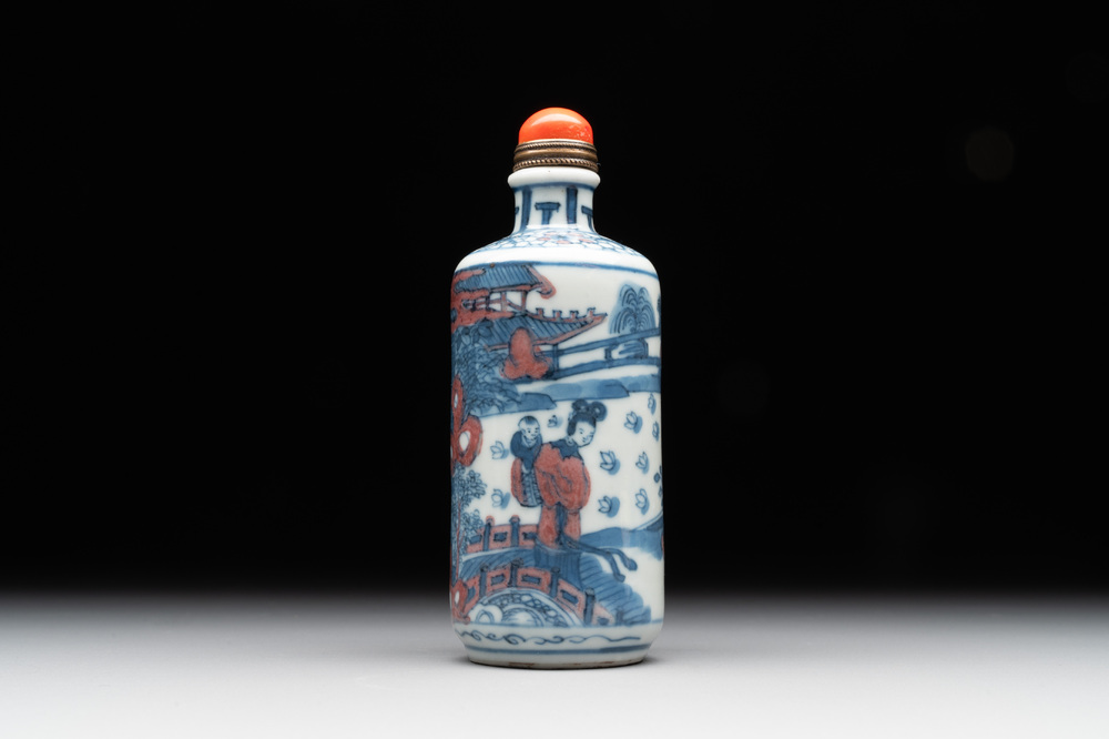 A Chinese blue, white and copper-red snuff bottle, Kangxi mark, 19th C.