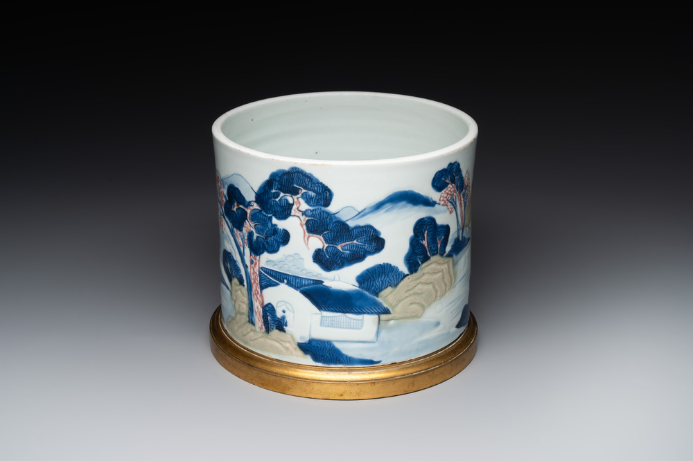 A large Chinese blue, white, celadon and copper-red brush pot on a later gilt bronze foot, 'bitong', Kangxi
