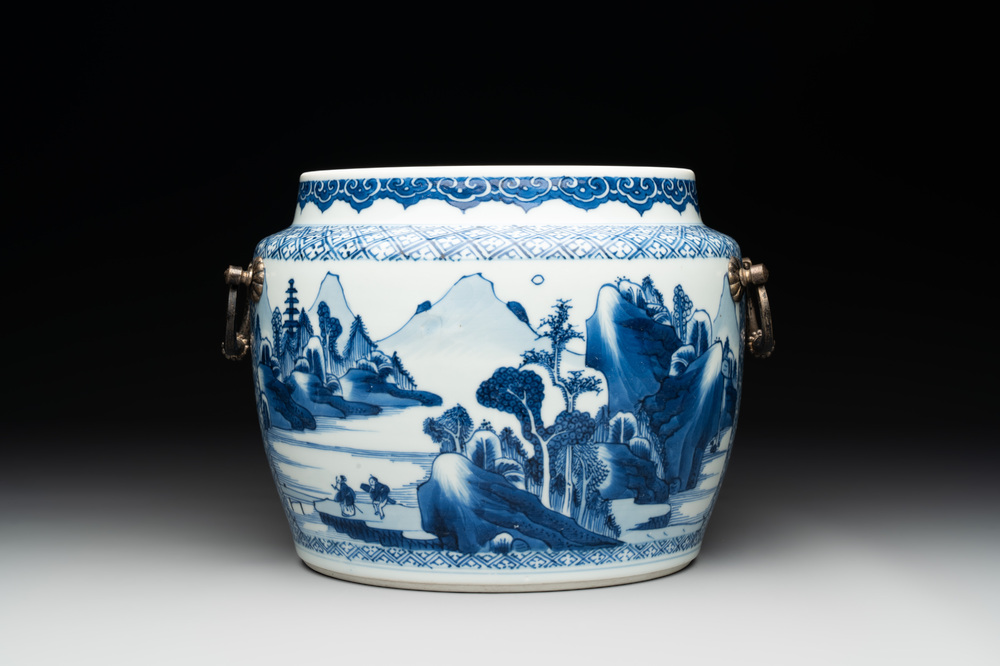 A fine Chinese blue and white 'landscape and antiquities' bowl with silver handles, Kangxi