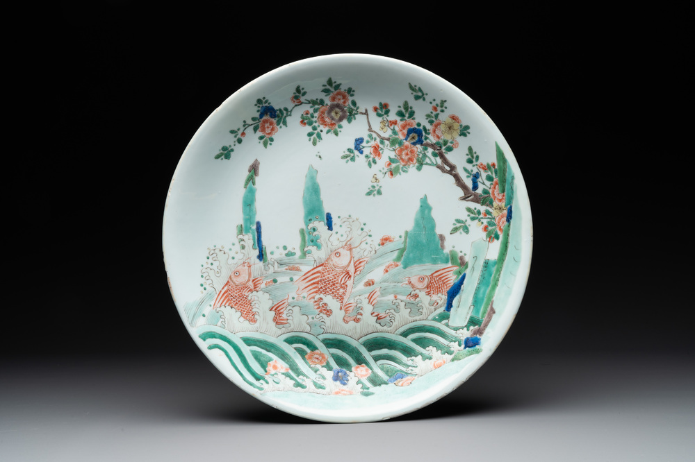 A Chinese famille verte 'leaping carps' dish, artemisia leaf mark, Kangxi