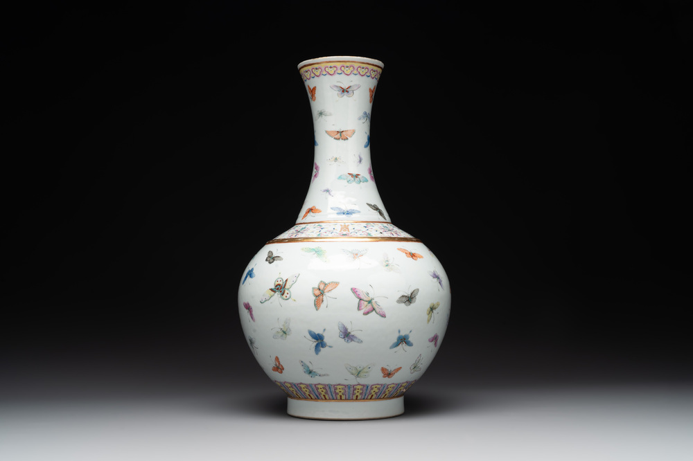 A Chinese famille rose 'butterfly' bottle vase, Guangxu mark and of the period